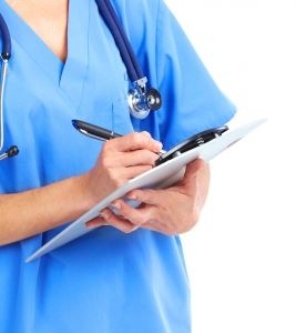 Medical doctor holding clipboard