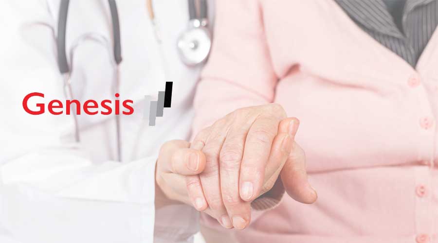 Doctor holding older woman's hand with Genesis logo