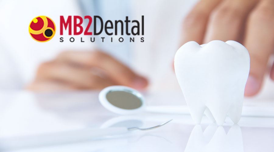 Dental tooth and equipment with MB2 Dental Solutions logo